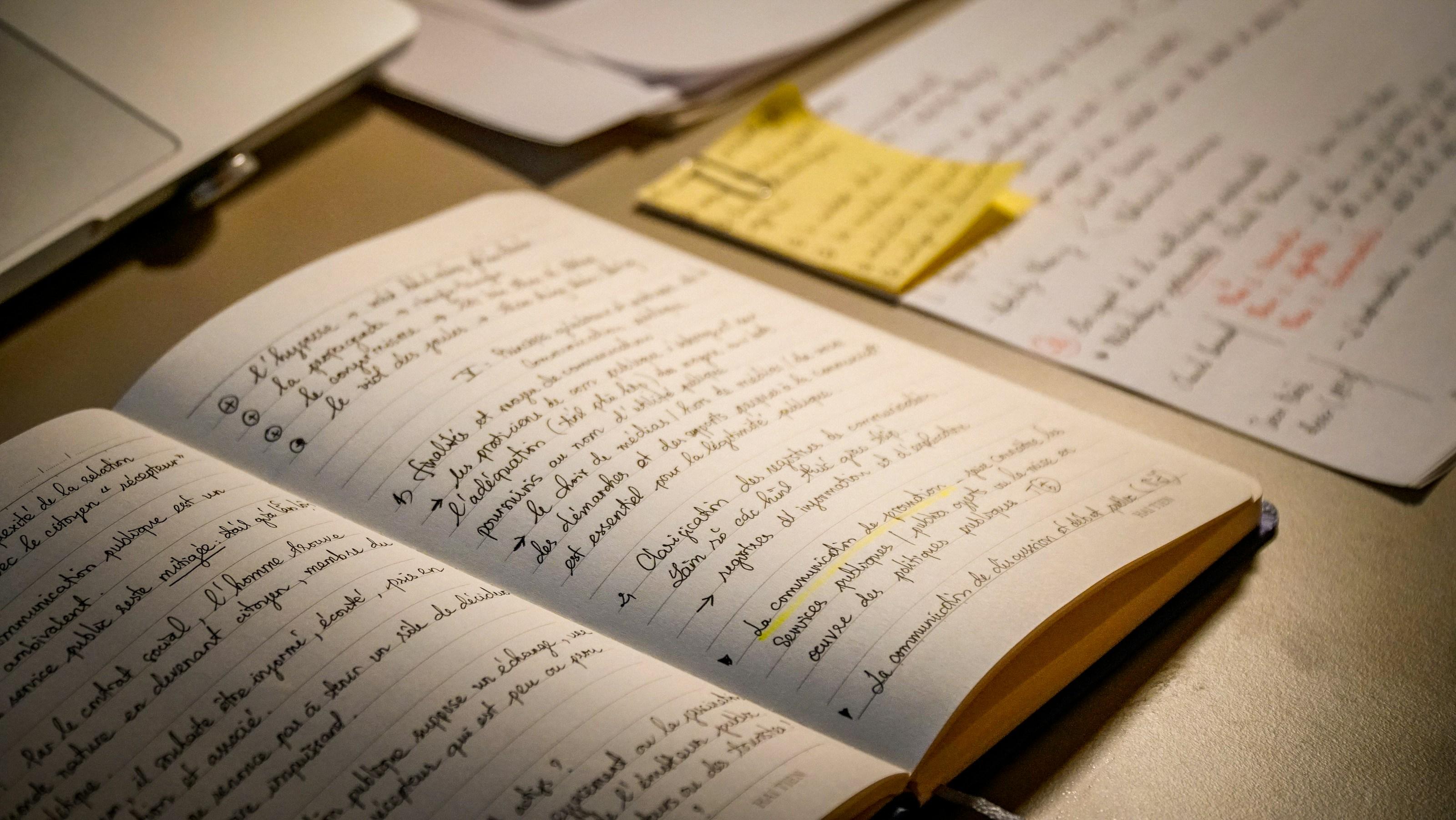 A notebook filled with handwritten notes