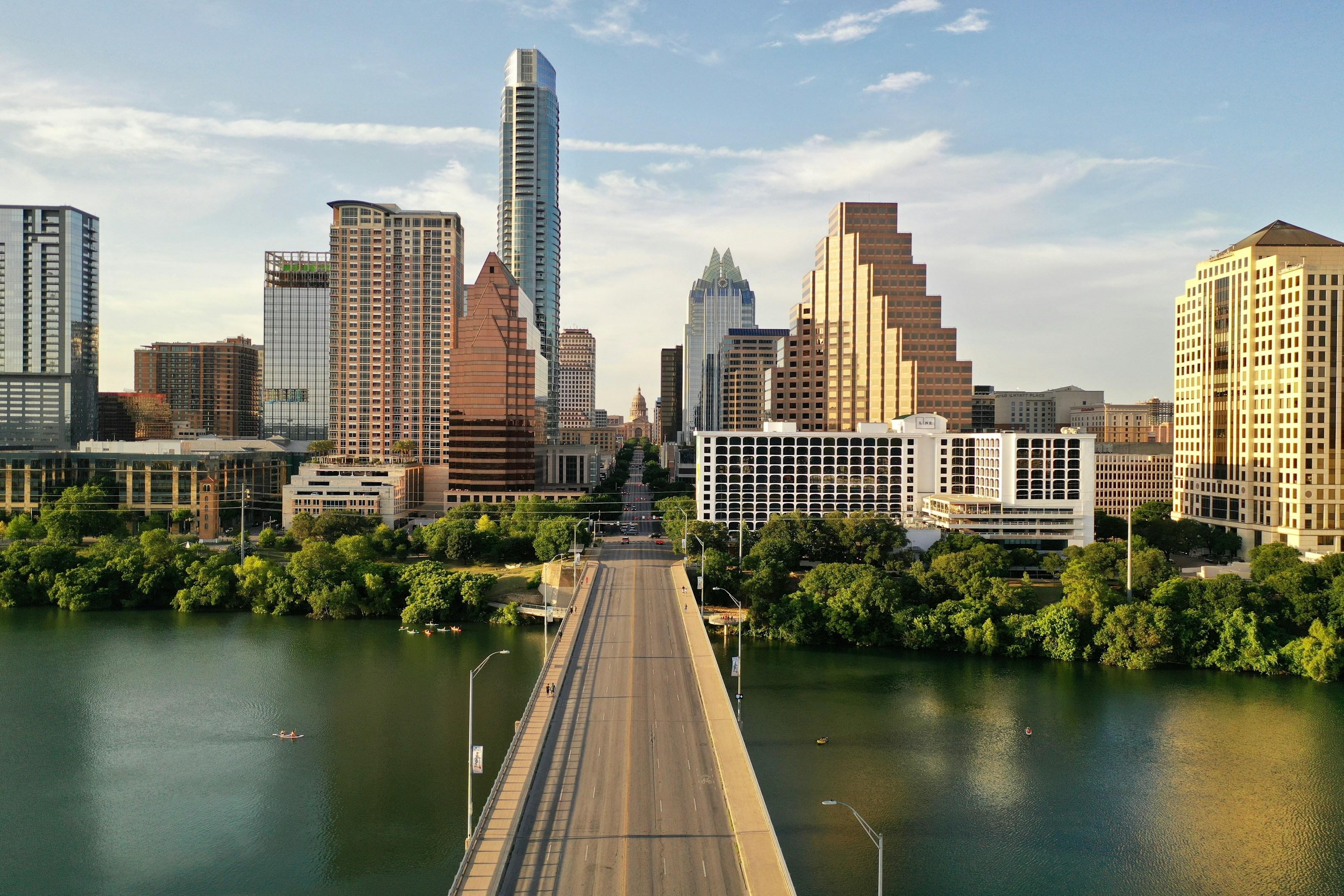 The Austin skyline over the river at sunset